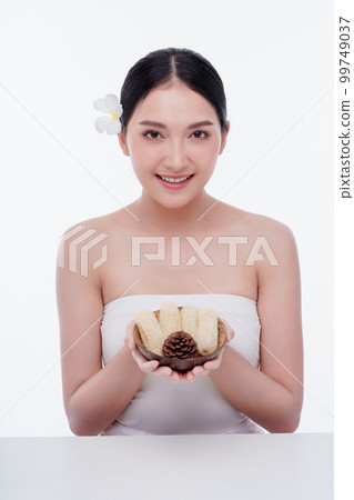 Beauty woman perfect face fresh clean skin portrait isolated on white. Beautiful asian girl with make up and beauty healthy skin color lips red and hair portrait. Spa and skin care concept. 99749037