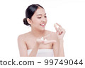 Woman holding Shells polished to pearly surface. The polished shells before being used to make pearl jewelry 99749044