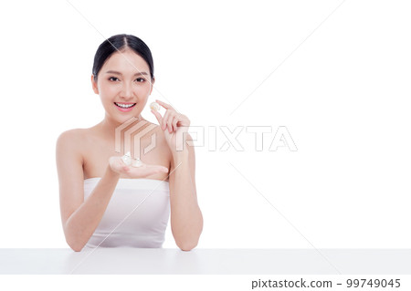 Woman holding Shells polished to pearly surface. The polished shells before being used to make pearl jewelry Woman holding Shells polished to pearly surface. The polished shells before being used to make pearl jewelry 99749045