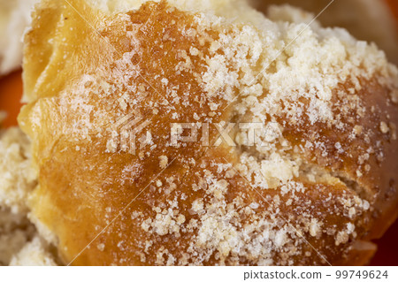 Sweet fresh bun with filling, close up Sweet fresh bun with filling, close up 99749624