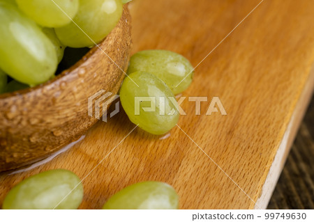 Fresh sweet green grapes, close up Fresh sweet green grapes, close up 99749630