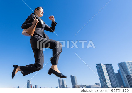 Image of an active career woman Image of an active career woman 99751370