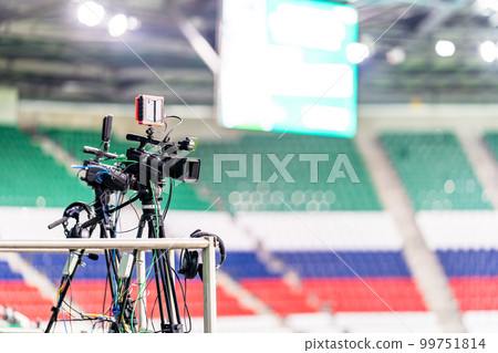 professional video camera broadcasting a football match professional video camera broadcasting a football match 99751814