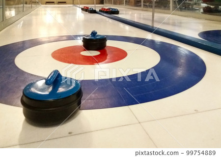 Group of curling stones 99754889