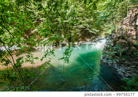 Blue Lagoon, mountain river among the rocks in the forest 99756177