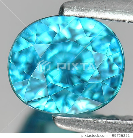 Natural gemstone blue topaz on white background 99756231
