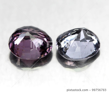 Natural beautiful spinel gemstones on gray background Natural beautiful spinel gemstones on gray background 99756783