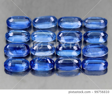 Natural beautiful gemstone kyanite on gray background 99756810