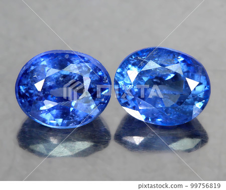 Natural beautiful gemstone kyanite on gray background 99756819