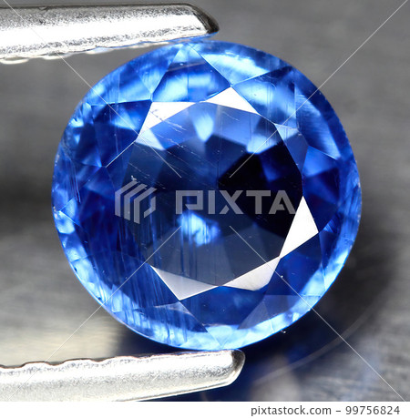 Natural beautiful gemstone kyanite on gray background 99756824
