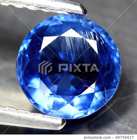 Natural beautiful gemstone kyanite on gray background 99756827