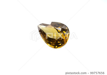 Natural grossular garnet gemstone on white background Natural grossular garnet gemstone on white background 99757656