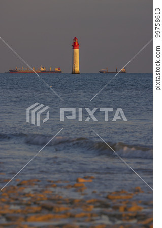 Phare de Chauvea near Ile de Re with ships to La Rochelle, Pays de la Loire, France Phare de Chauvea near Ile de Re with ships to La Rochelle, Pays de la Loire, France 99758613