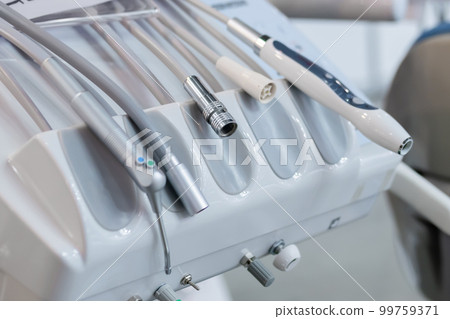 Different tools and dentistry instruments in dental office - close up view Different tools and dentistry instruments in dental office - close up view 99759371