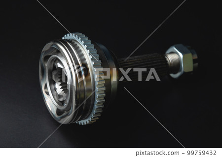 New CV joint on a black background. Constant velocity joint. New spare part New CV joint on a black background. Constant velocity joint. New spare part 99759432