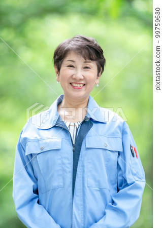 Woman in work clothes Fresh green 99759680
