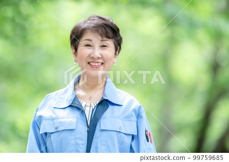 Woman in work clothes Fresh green 99759685