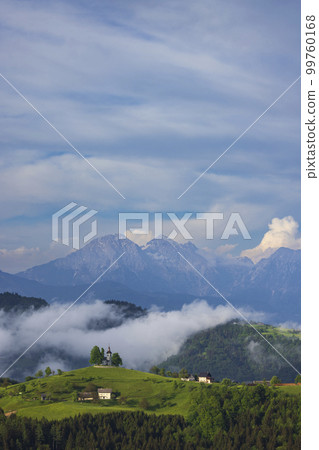Landscape with St. Thomas Church (Cerkev Sveti Tomaz) near Skofja Loka, Slovenia 99760168