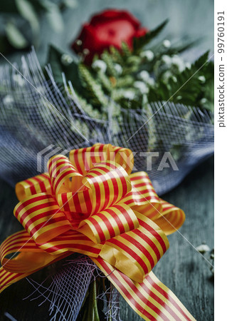 red rose in a bouquet for Saint George Day red rose in a bouquet for Saint George Day 99760191