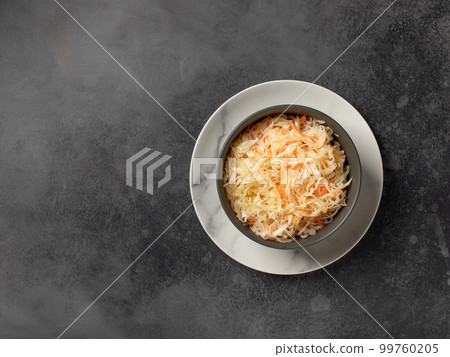 homemade fermented cabbage in a bowl. healthy vegan salad.  99760205