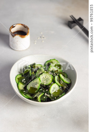 Japanese Sunomono salad with wakame seaweed and cucumber in bowl. Japanese Sunomono salad with wakame seaweed and cucumber in bowl. 99761855