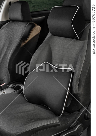A soft pillow for the lower back and neck in the car 99763729