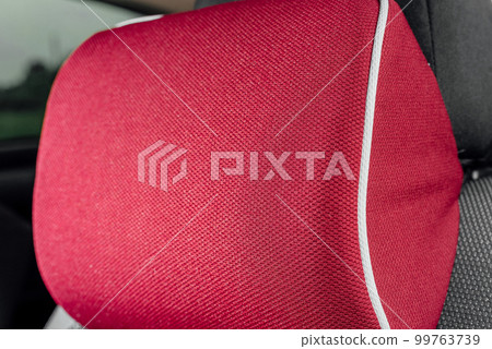 A soft pillow for the lower back and neck in the car A soft pillow for the lower back and neck in the car 99763739