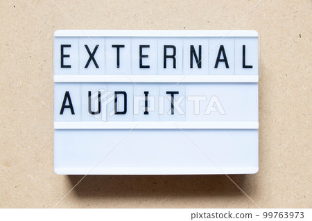 Lightbox with word external audit on wood background Lightbox with word external audit on wood background 99763973