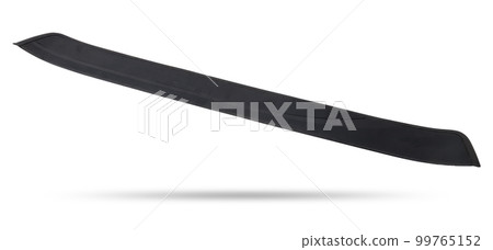 A black plastic decorative door sills in an automobile parsing for sale or repair in a workshop on a white isolated background in a photo studio. A black plastic decorative door sills in an automobile parsing for sale or repair in a workshop on a white isolated background in a photo studio. 99765152