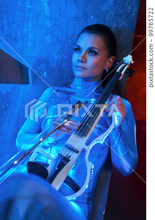 Neon portrait of woman violinist with music instrument 99765722