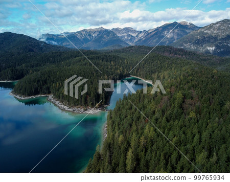 Great view of the snow rocky massif. Popular tourist attraction. Dramatic  99765934