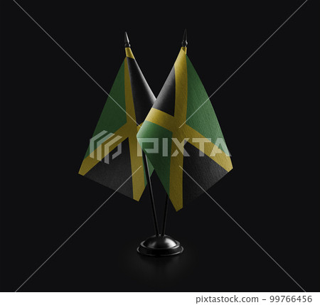 Small national flags of the Jamaica on a black background Small national flags of the Jamaica on a black background 99766456