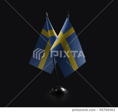 Small national flags of the Sweden on a black background Small national flags of the Sweden on a black background 99766462