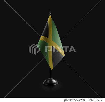 Small national flag of the Jamaica on a black background Small national flag of the Jamaica on a black background 99766517
