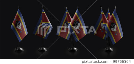 Small national flags of the Swaziland on a black background Small national flags of the Swaziland on a black background 99766564