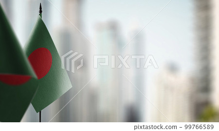 Small flags of the Bangladesh on an abstract blurry background 99766589