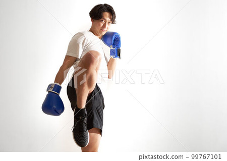 Young man doing kickboxing training boxercise image Young man doing kickboxing training boxercise image 99767101