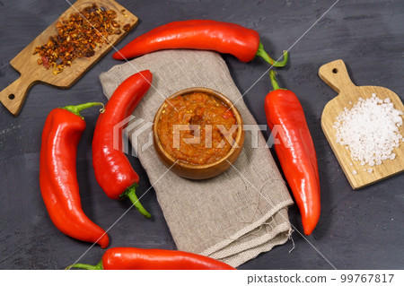 Ajvar from sweet peppers, eggplant, tomatoes, garlic and onions with spices. Balkan food. 99767817
