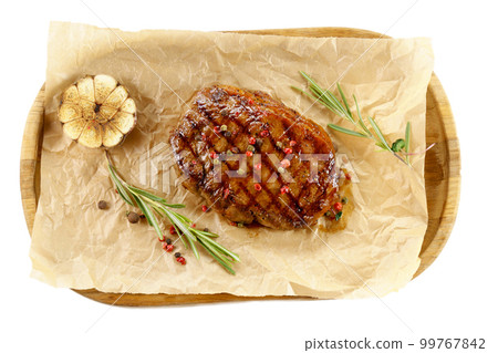 Beef meat steak close-up, grilled in a restaurant. Food recipe background. Close up. Isolated on a white background 99767842