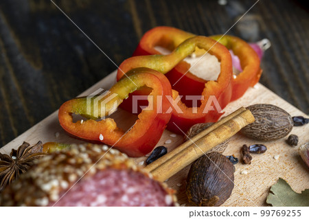Sliced into pieces fresh ripe sweet pepper Sliced into pieces fresh ripe sweet pepper 99769255