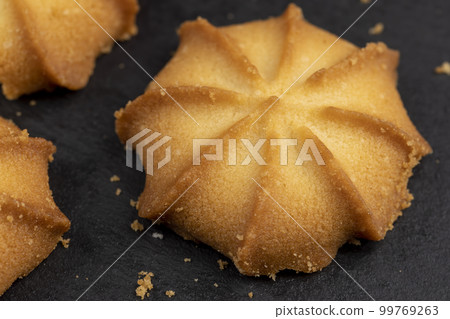 thin and crispy shortbread cookies on the table thin and crispy shortbread cookies on the table 99769263