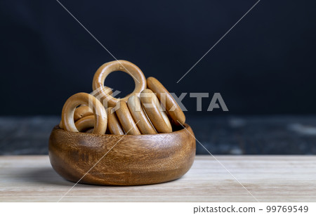 solid flour product bagels, close up solid flour product bagels, close up 99769549