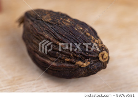 fragrant whole nutmeg in the kitchen 99769581
