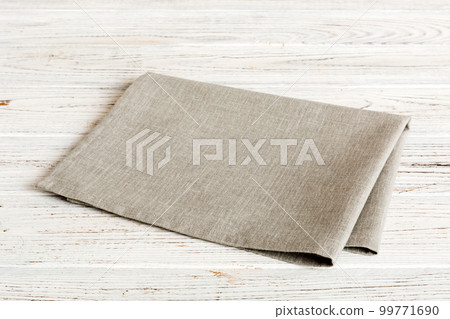 top view with gray kitchen napkin isolated on table background. Folded cloth for mockup with copy space, Flat lay. Minimal style 99771690