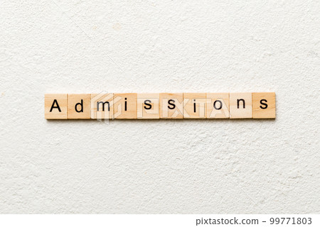 admissions word written on wood block. admissions text on table, concept 99771803