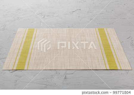 Perspective view of tablecloth for food on cement background. Empty space for your design 99771804