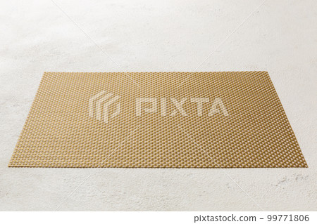 Perspective view of brown tablecloth for food on cement background. Empty space for your design 99771806