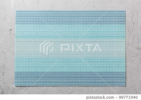 Top view of blue tablecloth for food on cement background. Empty space for your design 99771940