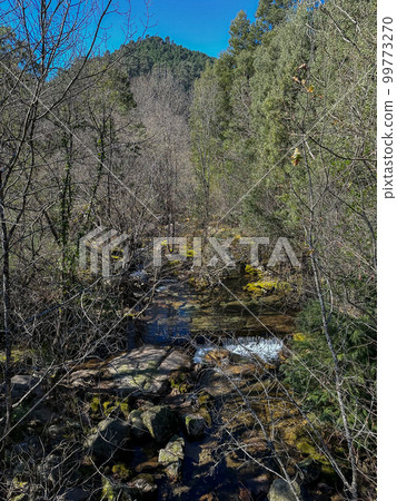 Water stream near Fecha de Barjas waterfall Water stream near Fecha de Barjas waterfall 99773270