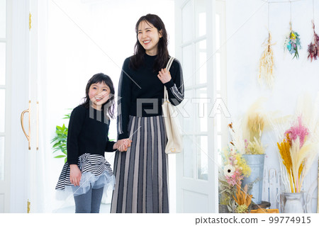 Parent and child going out Parent and child going out 99774915